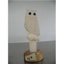 White ivory owl 5" tall carved by A. W. Slwooko with inset baleen eyes ()