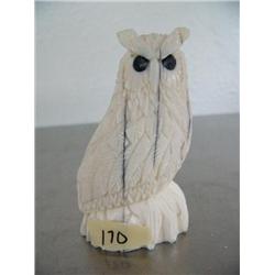 3-1/2" white ivory owl by A. W. Slwooko ()