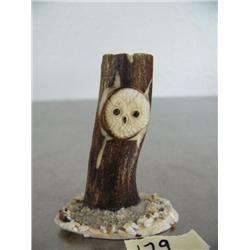 2-1/2" ivory owl's face mounted on antler ()