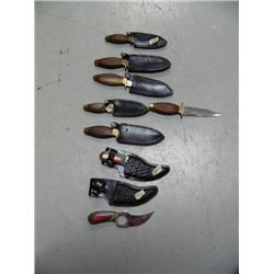 Group of 8 knives with wood handles ()