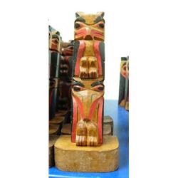 QUANTITY 12: wooden totem poles- imported, not Alaskan- 6" tall- top bidder takes as many as they wa