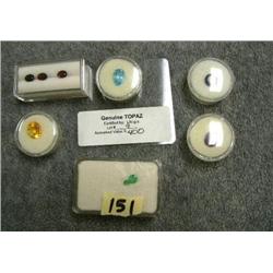 Lot of six boxes of gemstones with emeralds, citrines, garnets, topaz