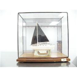 8" white ivory and baleen sailing ship by Jonal Tulek from Nome, AK- in glass case ()