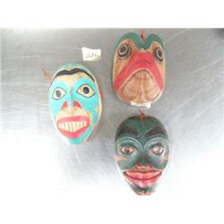 Lot of 3 imported, not Alaskan small wooden hand carved and painted masks ()