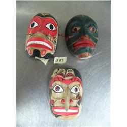 Lot of 3 imported, not Alaskan small wooden hand carved and painted masks ()