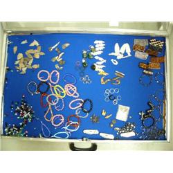 Case of brand new items- totems, bracelets, trade beads, knives, rings, key chains ()