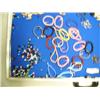 Image 2 : Case of brand new items- totems, bracelets, trade beads, knives, rings, key chains ()
