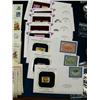 Image 7 : Display case full of Gold Collector's Stamps, sterling and gold rings with diamonds, various other p