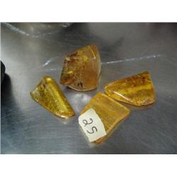 Lot of 4 pieces of amber chunks approx. 2" long each ()