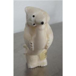 3-1/2" ivory bear eating a seal- probably from Gambell, St. Lawrence Island ()