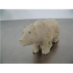 3-1/2" very detailed carved bone bear notice the great detail of nose, moth, bottom of feet ()
