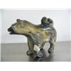 Image 1 : 7-1/2" soapstone carved husky with tail laying up on its back by Eddie Lee ()