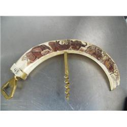 Large hippo tooth- 11-1/2" long- scrimshawed with 5 African animal heads done by Lovemore Messina- c