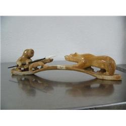 14-1/2" carved bone polar bear, Eskimo man and dog with inset baleen eyes, baleen and ivory harpoon 
