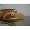 Image 2 : 5" fossilized ivory eagle's head and man's face with inset baleen and ivory eyes mounted on fossiliz