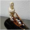 Image 2 : 15" ivory 5-dog team mounted on a mammoth ivory tusk done by H. B. Slwooko- with man and sled- sled 