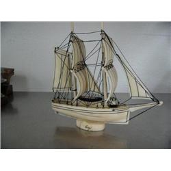 Ivory ship- 9" long and 8-1/2" high- signed by Willie Smalley- 5503 dated 1983- minimum bid of $1,20