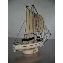 Ivory boat- 7" long and 7" high by Willie Smalley- 51383- minimum bid of $700 ()