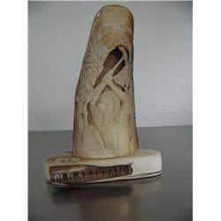 Mastodon ivory bark with relief carving of an old Alaskan- 7" high and 5" wide ()
