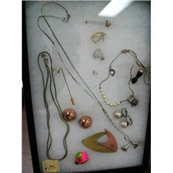 Framed costume jewelry (74)