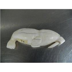 Ivory walrus laying down- 5-1/2" long signed Andrew Kookok ()