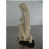 Image 2 : Mammoth ivory carving of Alaskan Native with sled dog on wood base- 5" high- Russian ()