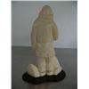 Image 3 : Mammoth ivory carving of Alaskan Native with sled dog on wood base- 5" high- Russian ()