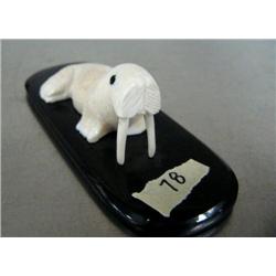 Ivory walrus on baleen base- 4-1/2" long and 1" high ()