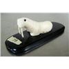 Image 2 : Ivory walrus on baleen base- 4-1/2" long and 1" high ()
