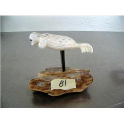 Ivory seal on ivory base on baleen stand- 3" high and long by Charles Edwards ()