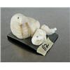 Image 1 : 3 ivory walruses with walrus whiskers for tusks on baleen base signed by Robert Apatiki ()