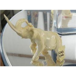 Cracked ivory elephant- 3" ()