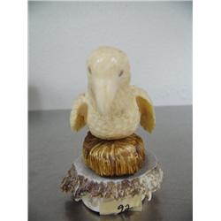 Ivory owl on ivory with antler base- 3-1/2" tall and 4-1/2" long ()