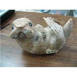 CHOICE on two 5" soapstone carved sea otters by Eddie Lee ()