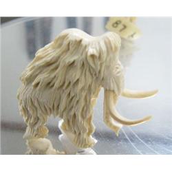 CHOICE on 3 ivory woolly mammoth- 1-3/4" high and long ()