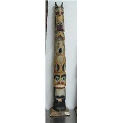 CHOICE on four 28" totem poles- imported, not Alaskan ()