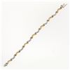 Image 5 : Solid 18K TT Gold 1.40 ctw Fine Round Brilliant Diamond Wavy Link Tennis Bracele
