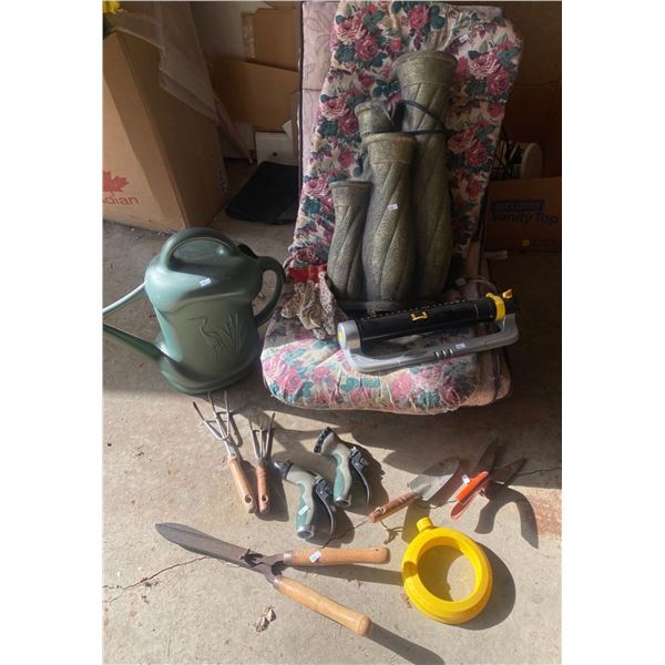 Assortment Of Garden Decor And Supplies