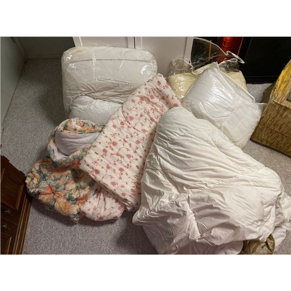 Large Assortment Of Bedding And Pillows