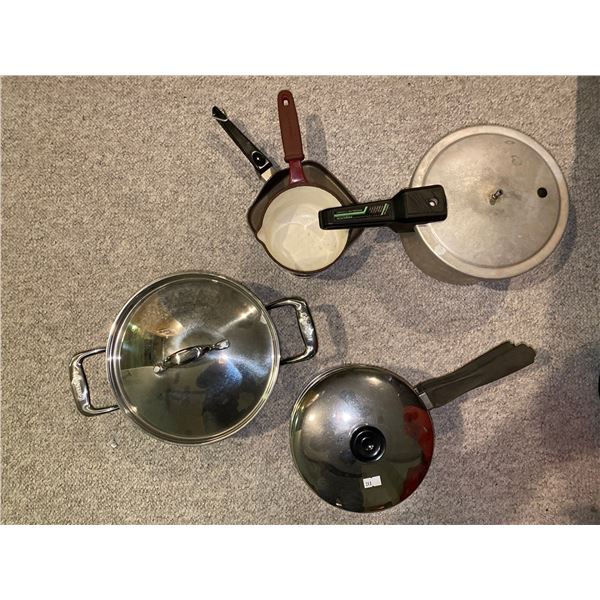 Assortment Of Stainless Steel And Cast Iron Pots And Pan