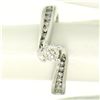 Image 1 : 14k White Gold 0.55 ctw Round Diamond Channel & Solitaire Twist Swirl Bypass Rin