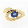 Image 4 : 14k Gold 0.80 ctw Oval Sapphire Solitaire Polished Grooved Open Loop Bypass Ring