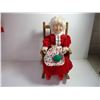 Image 2 : Mrs. Claus in Rocking Chair and Vase full of Artificial Poinsettias