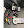 Image 3 : Lot of 1 Super Nintendo Entertainment System w/ Cords, Controller, & Games - Used; POWERS ON/WORKS!