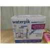 Image 2 : New Water Pik Floss, Oral B Brush Heads, Daily Facial Moisturizer, Body Wash 