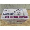 Image 2 : New Waterpik Water Flosser