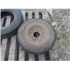Image 2 : 2 Tires ; (1) E78 - 14 & (1) smaller with rim