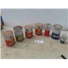 Image 1 : 7 Gulf Oil Cans 5/7 Full of Product: Super 10w30, Super Duty, Premium 10w30, XHD, Gas