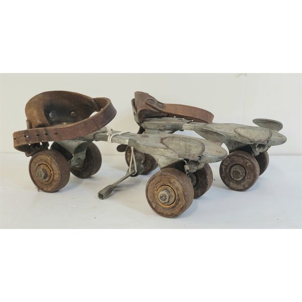 PAIR OF SUNSHINE ROLLER SKATES