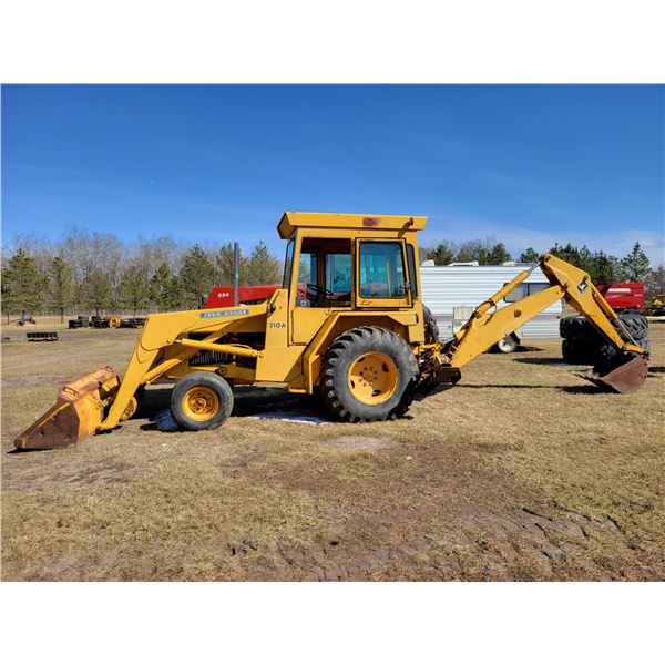 (Lots 54 to 57 are a Group Lot) JD 310A, 2x4 Backhoe, showing 4648 hrs, 17" bucket, SN. 331122T, PH 
